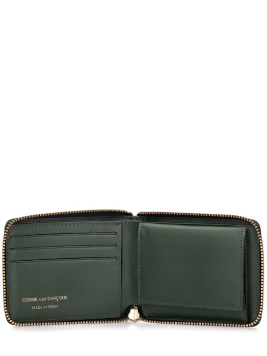 Comme des Garçons Wallet: Leather zip wallet - Bottle Green - men_1 | Luisa Via Roma