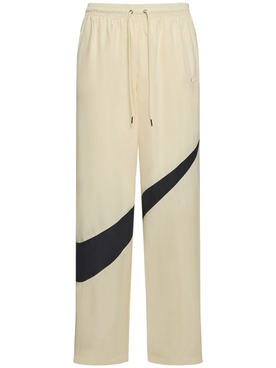 Nike: Pantalon en nylon tissé Swoosh - Coconut Milk/Bl - men_0 | Luisa Via Roma