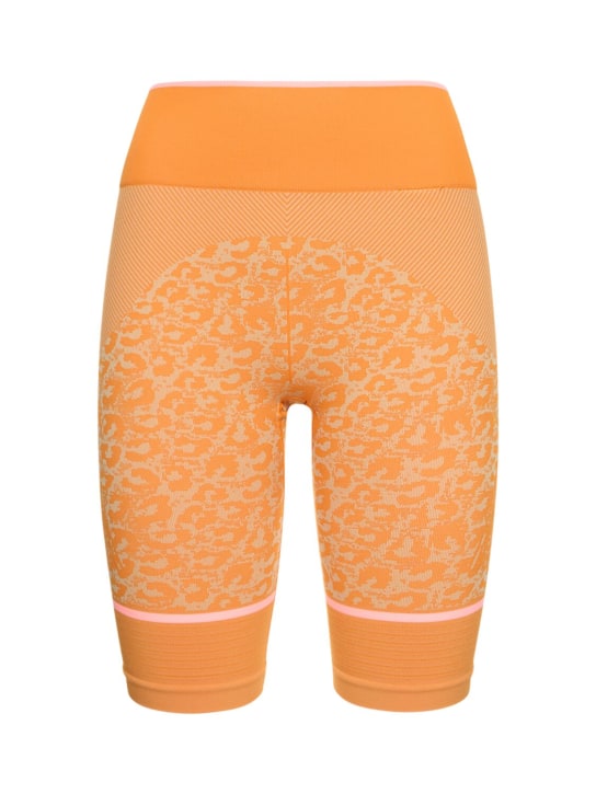 adidas By Stella McCartney: Short cycliste en tissu tech recyclé True Strength - Orange - women_0 | Luisa Via Roma