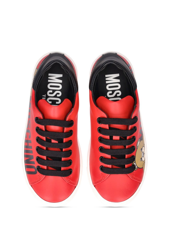 Moschino: Leather lace-up sneakers w/logo - Red - kids-boys_1 | Luisa Via Roma