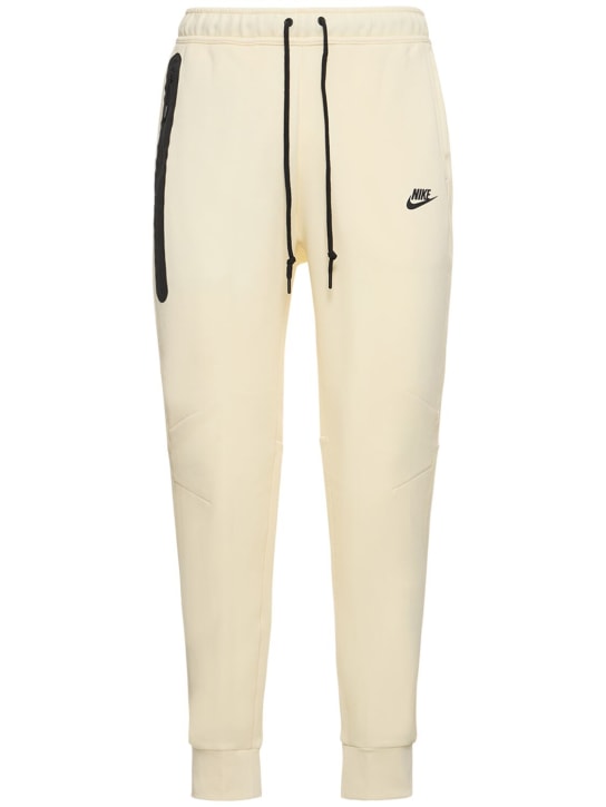 Nike: Pantalones deportivos Tech Fleece - Coconut Milk/Bl - men_0 | Luisa Via Roma