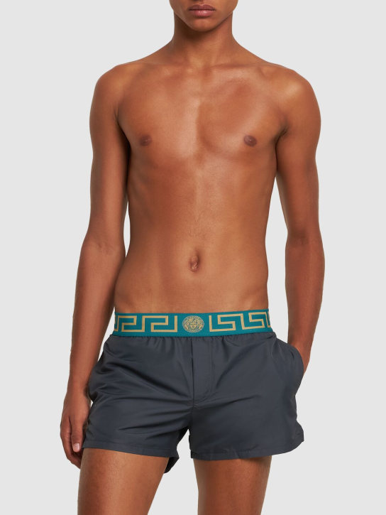 Versace: Greca logo nylon swim shorts - Anthracite - men_1 | Luisa Via Roma