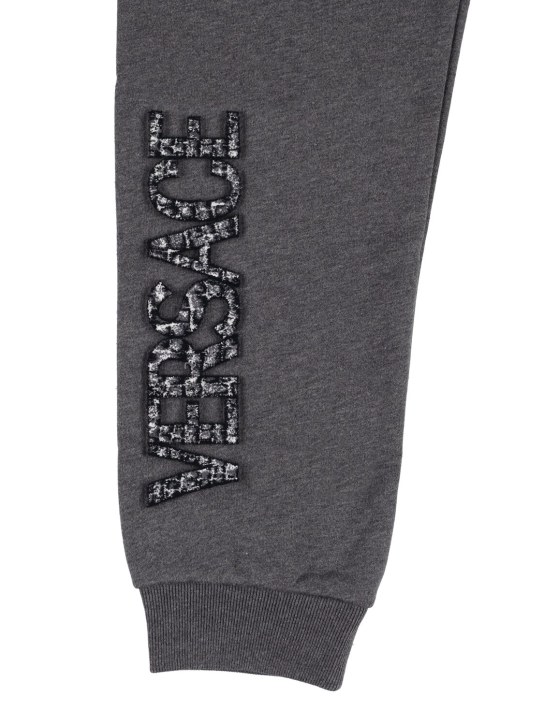 Versace: Embroidered logo cotton sweatpants - Grey - kids-girls_1 | Luisa Via Roma