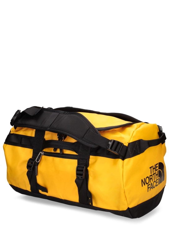 The North Face: 31L Base camp duffle bag - Yellow - men_1 | Luisa Via Roma