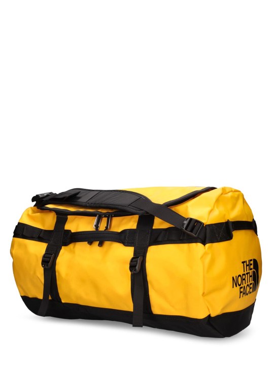 The North Face: 50L Base camp duffle bag - Yellow - men_1 | Luisa Via Roma