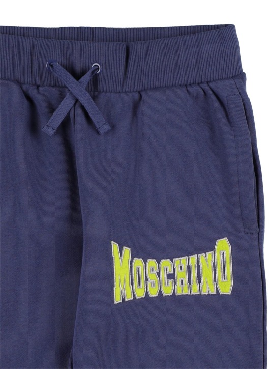 Moschino: Pantalon de sport en coton à logo - Bleu Marine - kids-girls_1 | Luisa Via Roma