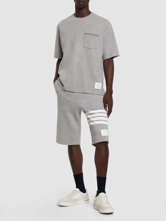 Thom Browne: Intarsia stripes cotton jersey shorts - Light Grey - men_1 | Luisa Via Roma