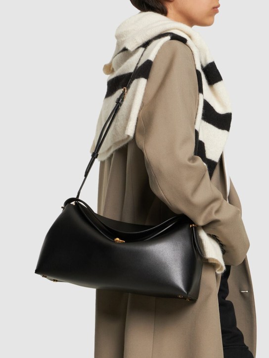 Toteme: T-Lock palmellata leather top handle bag - Black - women_1 | Luisa Via Roma