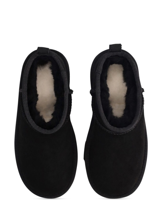 Ugg: Classic Ultra Mini shearling boots - Black - kids-boys_1 | Luisa Via Roma