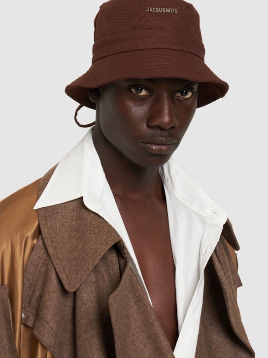 Jacquemus: Le Bob Gadjo cotton canvas bucket hat - Brown - men_1 | Luisa Via Roma
