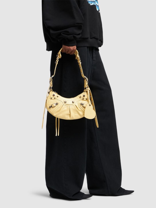 Balenciaga: XS Le Cagole leather shoulder bag - Butter Yellow - women_1 | Luisa Via Roma