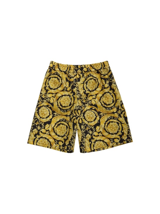 Versace: Shorts in popeline di cotone stampato - Nero/Oro - kids-boys_0 | Luisa Via Roma