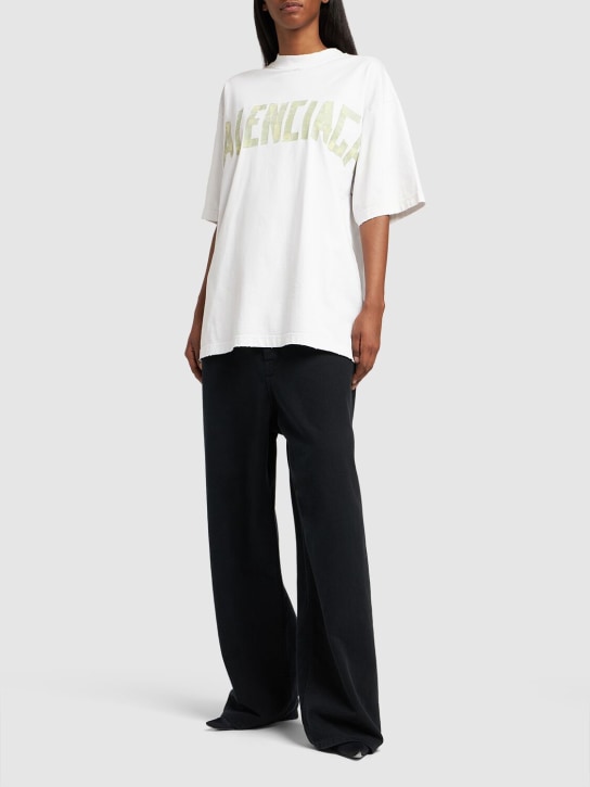 Balenciaga: Baumwoll-T-Shirt mit Band- und Vintage-Effekt - Weiß - women_1 | Luisa Via Roma