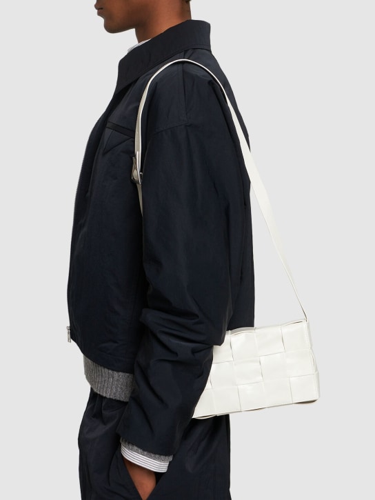 Bottega Veneta: Intreccio leather crossbody bag - White - men_1 | Luisa Via Roma