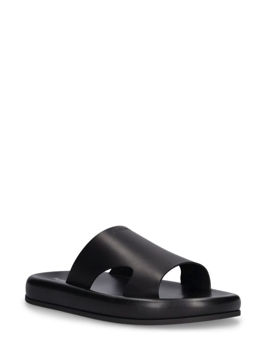 Ferragamo: Ferragamo logo leather sandals - Black - men_1 | Luisa Via Roma