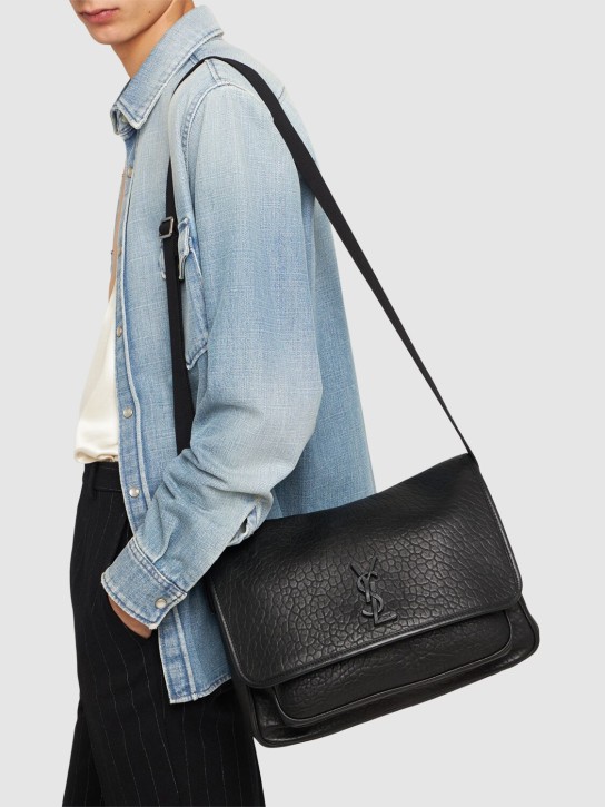 Saint Laurent: Niki leather messenger bag - Black - men_1 | Luisa Via Roma