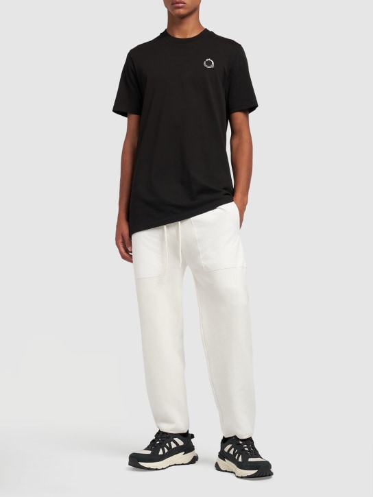 Moncler: CNY cotton piquet polo shirt - Black - men_1 | Luisa Via Roma