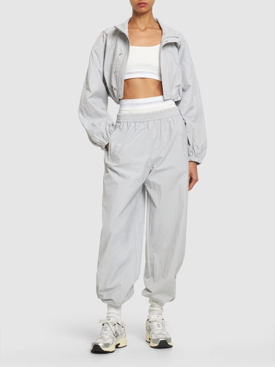 Alexander Wang: Nylon sweatpants w/ elastic trim - Grey - women_1 | Luisa Via Roma