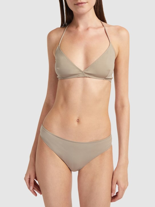 Saint Laurent: Nylon blend low waist bikini bottom - Beige - women_1 | Luisa Via Roma