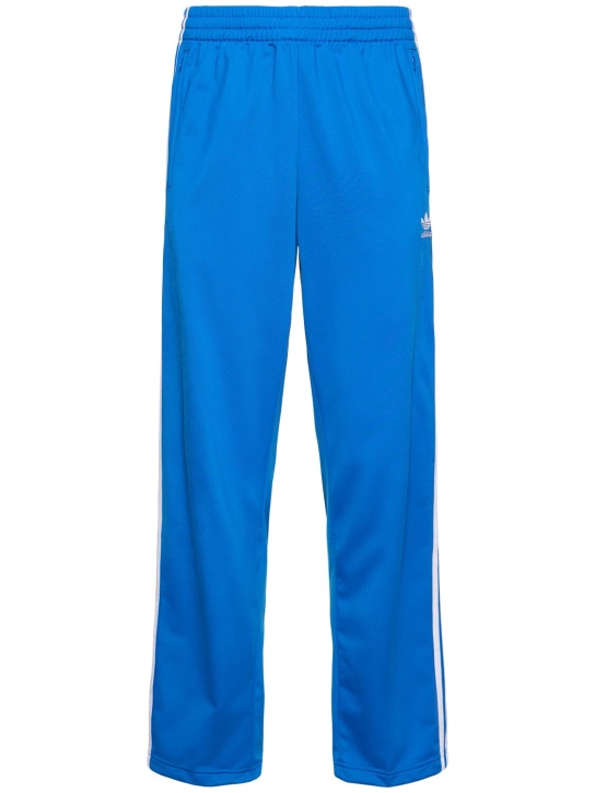 adidas Originals: Firebird tech track pants - Blue/White - men_0 | Luisa Via Roma