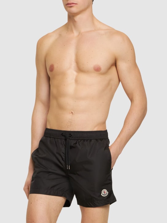 Moncler: Monogram tech swim shorts - Black - men_1 | Luisa Via Roma