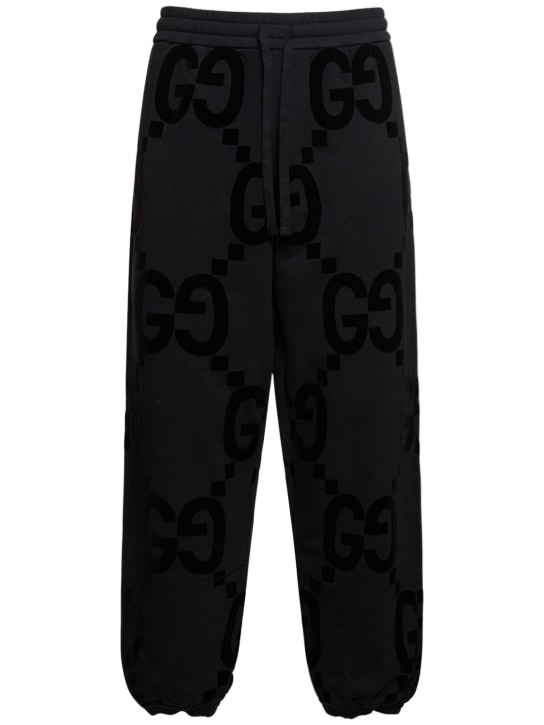 Gucci: GG flocked cotton sweatpants - Black - men_0 | Luisa Via Roma