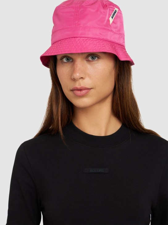 Jacquemus: Le Bob Ovalie nylon bucket hat - Neon Pink - women_1 | Luisa Via Roma