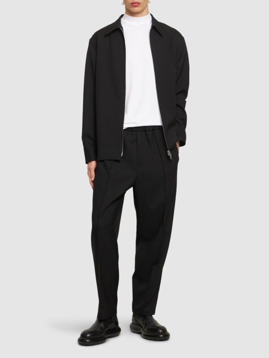 Jil Sander: 宽松版型短款裤子 - 黑色 - men_1 | Luisa Via Roma