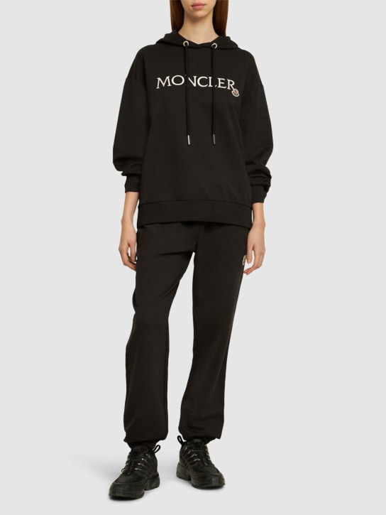 Moncler: Embroidered logo cotton jersey hoodie - Black - women_1 | Luisa Via Roma