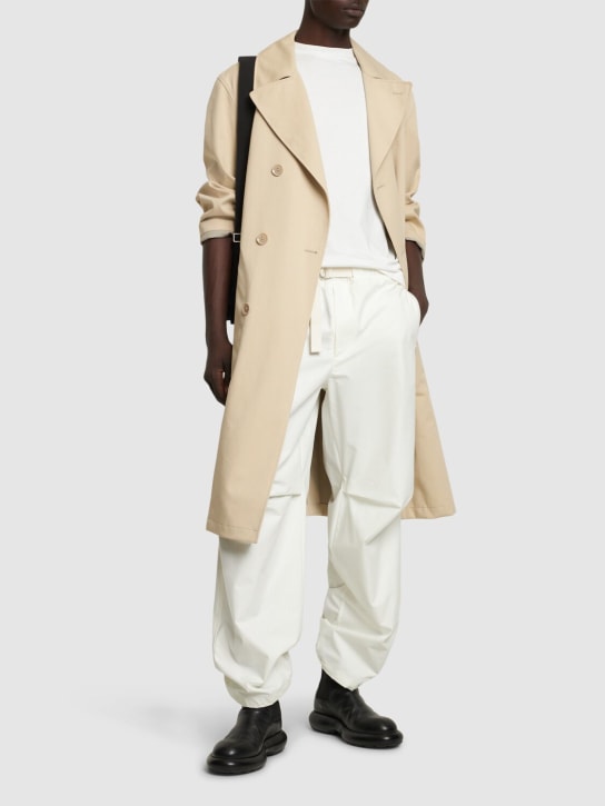 Jil Sander: 休闲版型棉质裤子 - 乳白色 - men_1 | Luisa Via Roma