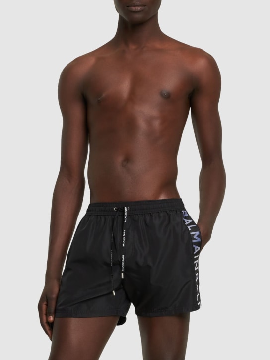 Balmain: Balmain logo tech swim shorts - Black/White - men_1 | Luisa Via Roma