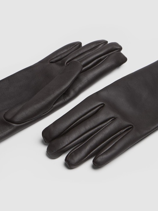 Saint Laurent: Leather gloves - Expresso - women_1 | Luisa Via Roma