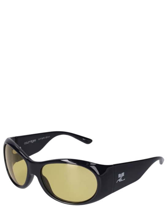 Courreges: Hybrid 01 round acetate sunglasses - Black/Yellow - women_1 | Luisa Via Roma