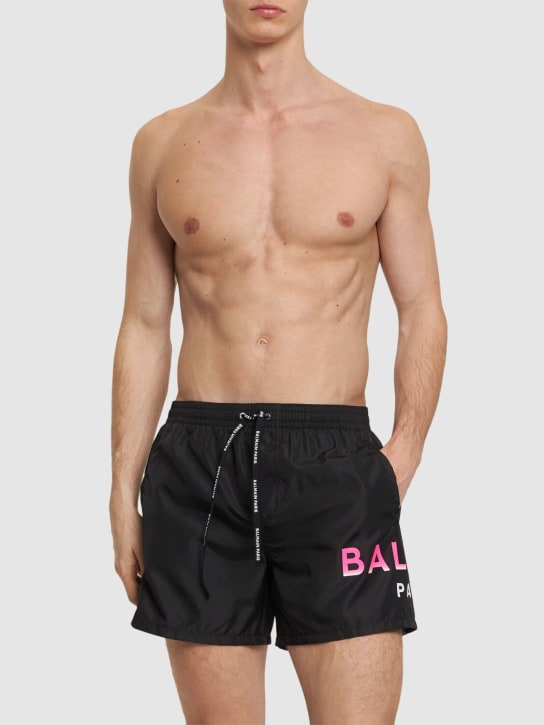Balmain: Balmain logo tech swim shorts - Black/Pink - men_1 | Luisa Via Roma