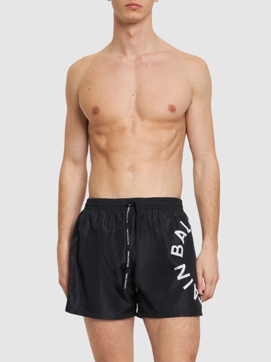 Balmain: Balmain logo tech swim shorts - Black/White - men_1 | Luisa Via Roma