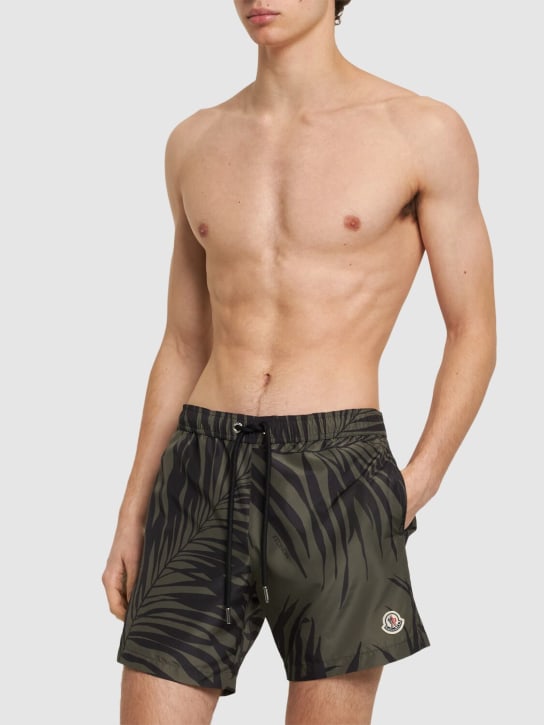 Moncler: Printed tech swim shorts - Oliva/Nero - men_1 | Luisa Via Roma