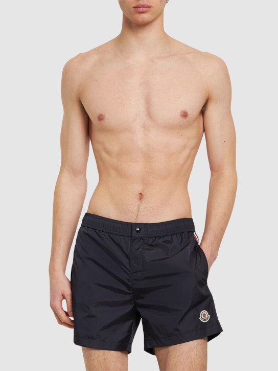 Moncler: Shorts mare in nylon con logo - Blu Notte - men_1 | Luisa Via Roma