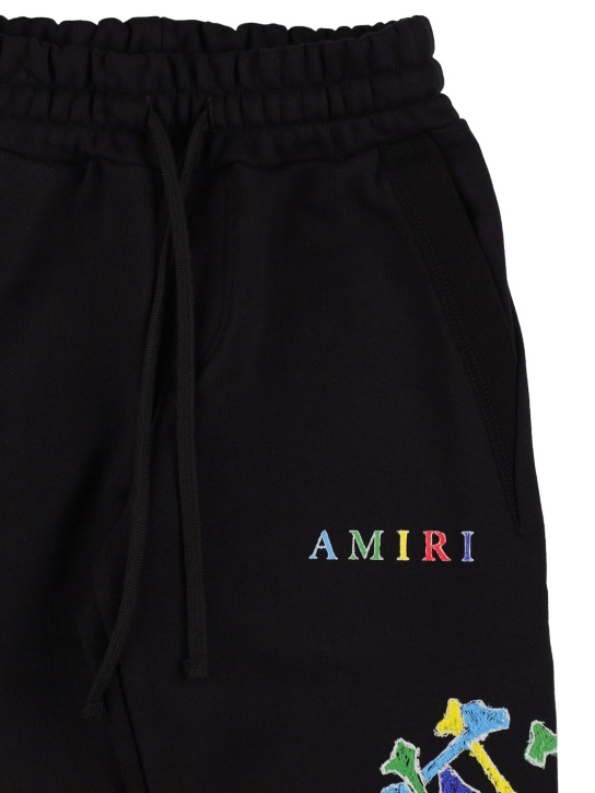 Amiri: Pantaloni in felpa di cotone stampata - Nero - kids-boys_1 | Luisa Via Roma