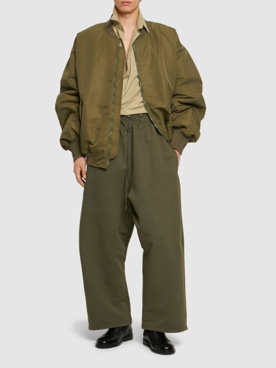 Hed Mayner: Compact brushed cotton jersey pants - Green - men_1 | Luisa Via Roma