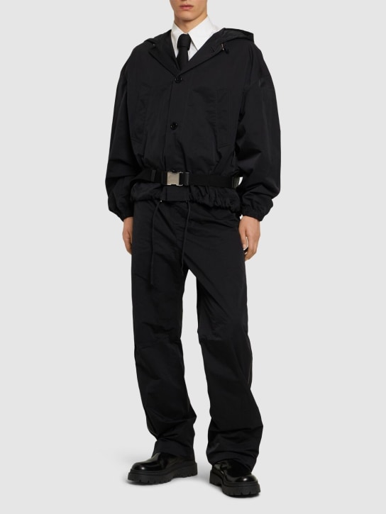 Bottega Veneta: Packable tech nylon hooded jacket - Black - men_1 | Luisa Via Roma