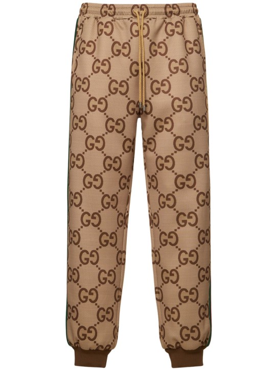 Gucci: GG printed tech jogging sweatpants - Camel/Brown - men_0 | Luisa Via Roma