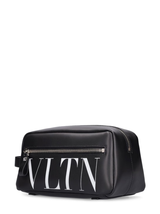 Valentino Garavani: VLTN medium leather toiletry bag - Black/White - men_1 | Luisa Via Roma