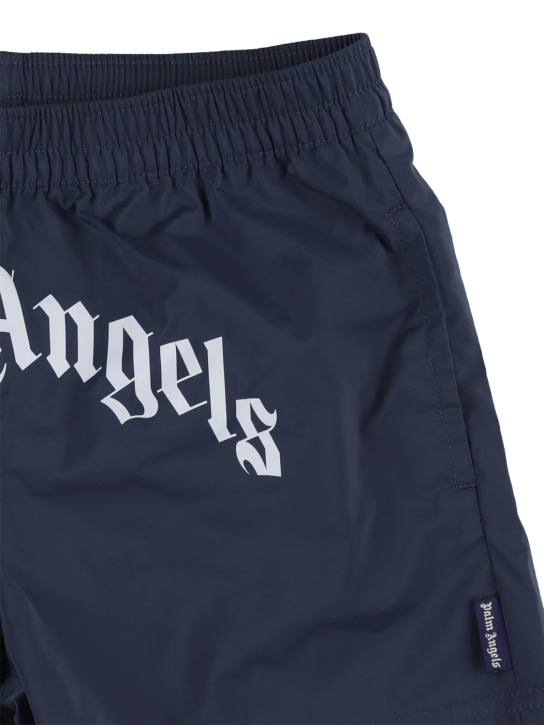 Palm Angels: Logo print nylon swim shorts - Navy - kids-boys_1 | Luisa Via Roma