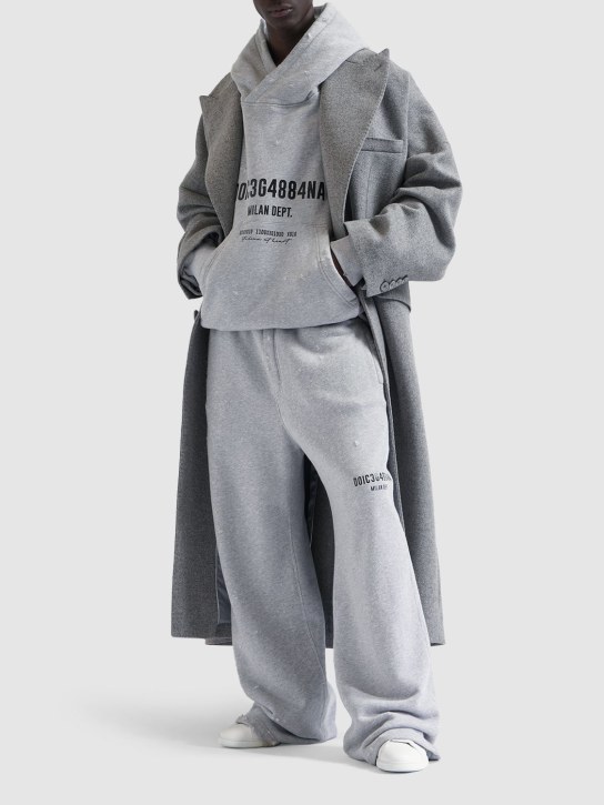 Dolce&Gabbana: Distressed cotton jersey jogging pants - Melange Grigio - men_1 | Luisa Via Roma