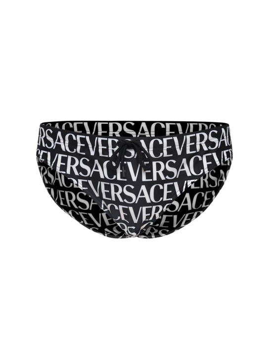 Versace: Bañador slip con estampado - Negro/Blanco - men_0 | Luisa Via Roma