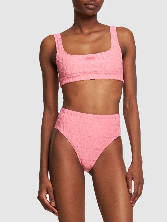 Versace: Dua Lipa terry jacquard bikini bottoms - Pink - women_1 | Luisa Via Roma