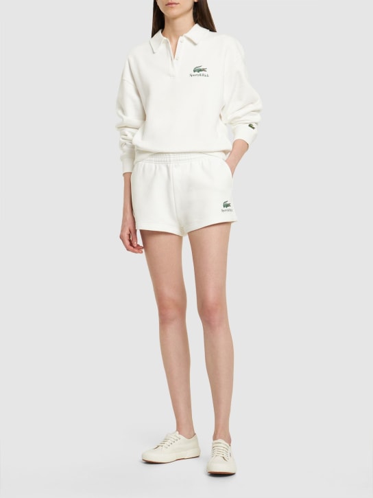 Sporty & Rich: Lacoste Serif disco shorts - Beige - women_1 | Luisa Via Roma