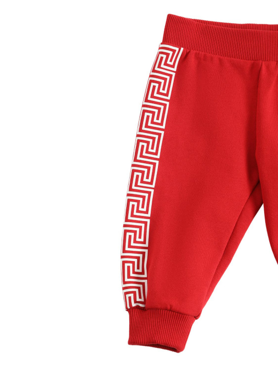 Versace: Pantaloni in felpa di cotone con greca - Rosso - kids-boys_1 | Luisa Via Roma
