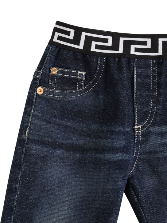 Versace: Jeans in denim di cotone con logo - Denim - kids-boys_1 | Luisa Via Roma