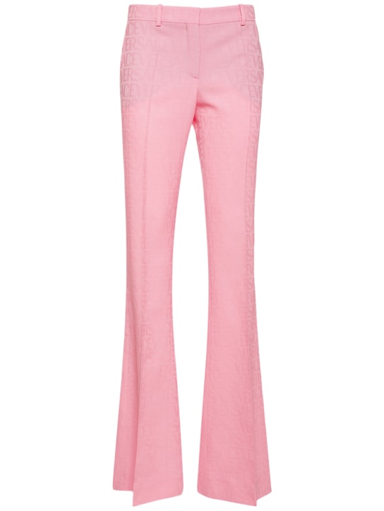 Versace: Logo jacquard wool flared pants - Pink - women_0 | Luisa Via Roma